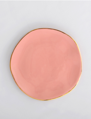 Рожева керамічна тарілка