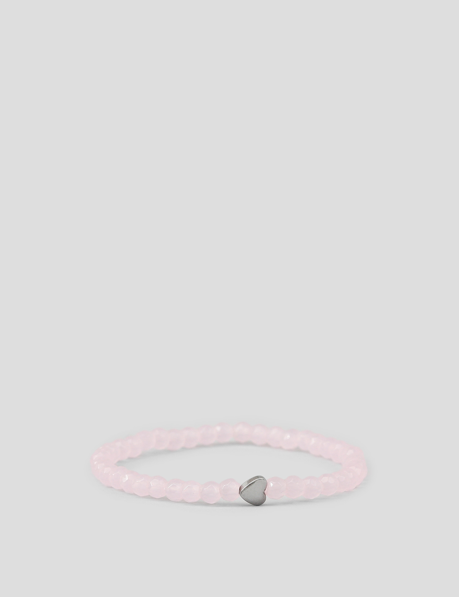 Картинка Жіночий рожевий браслет на еластичному шнурі