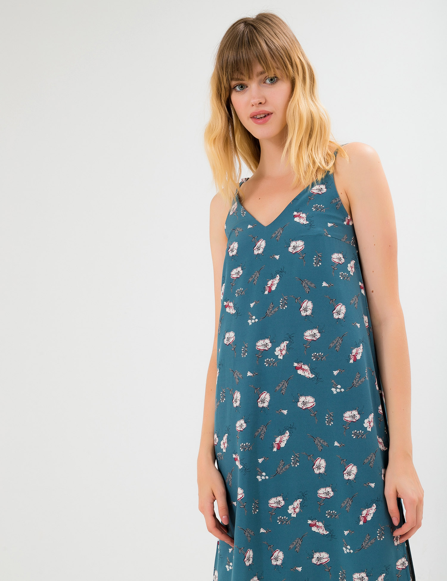 Картинка Синя сукня з рослинним візерунком