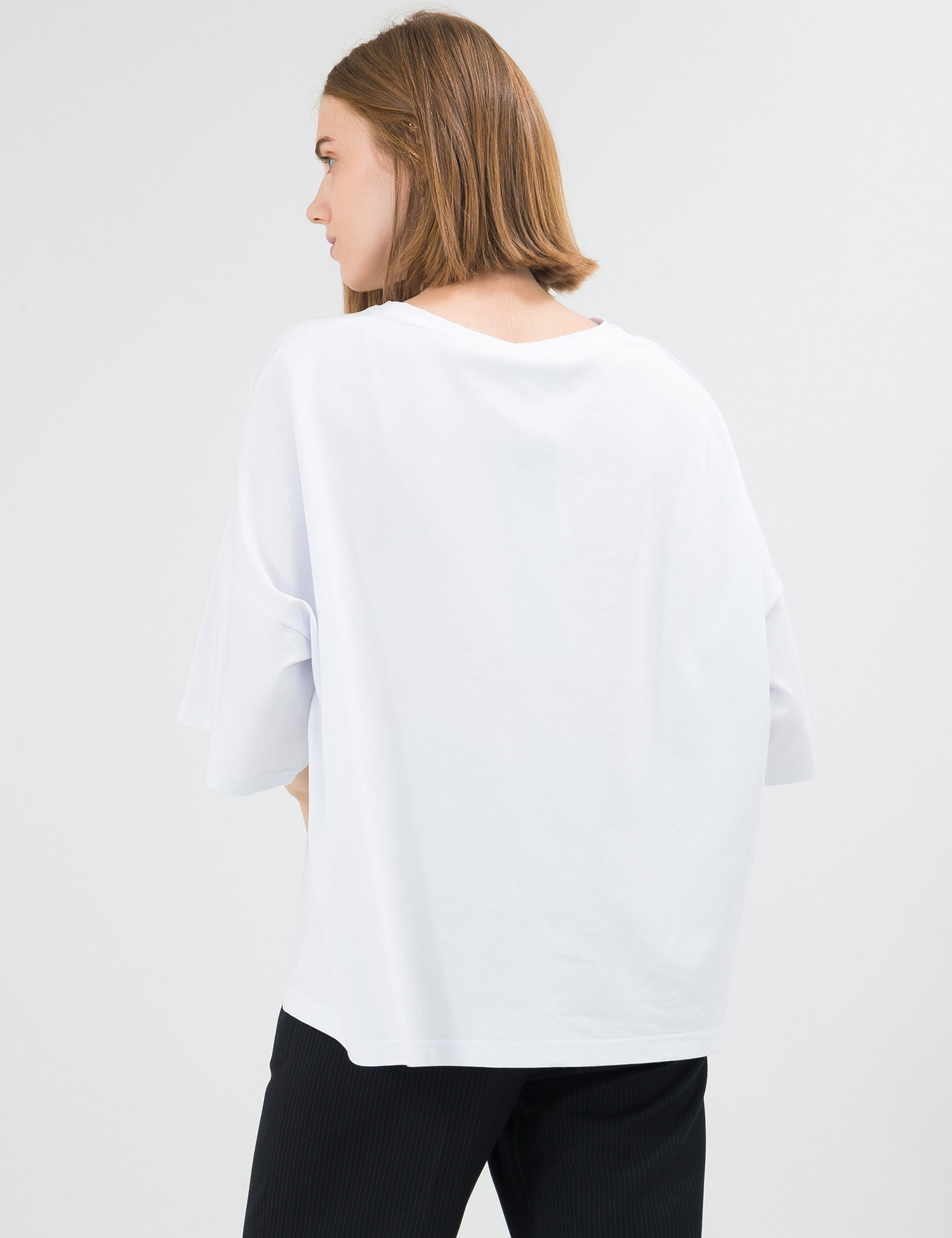 Картинка Жіноча біла оверсайз футболка з принтом