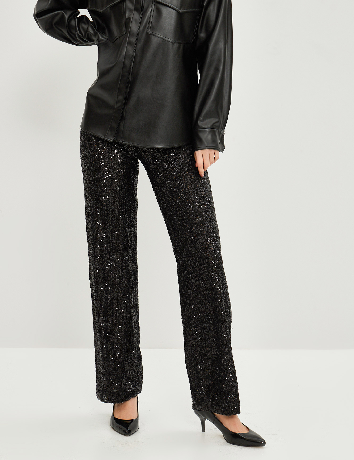 Картинка Жіночі чорні штани з паєтками