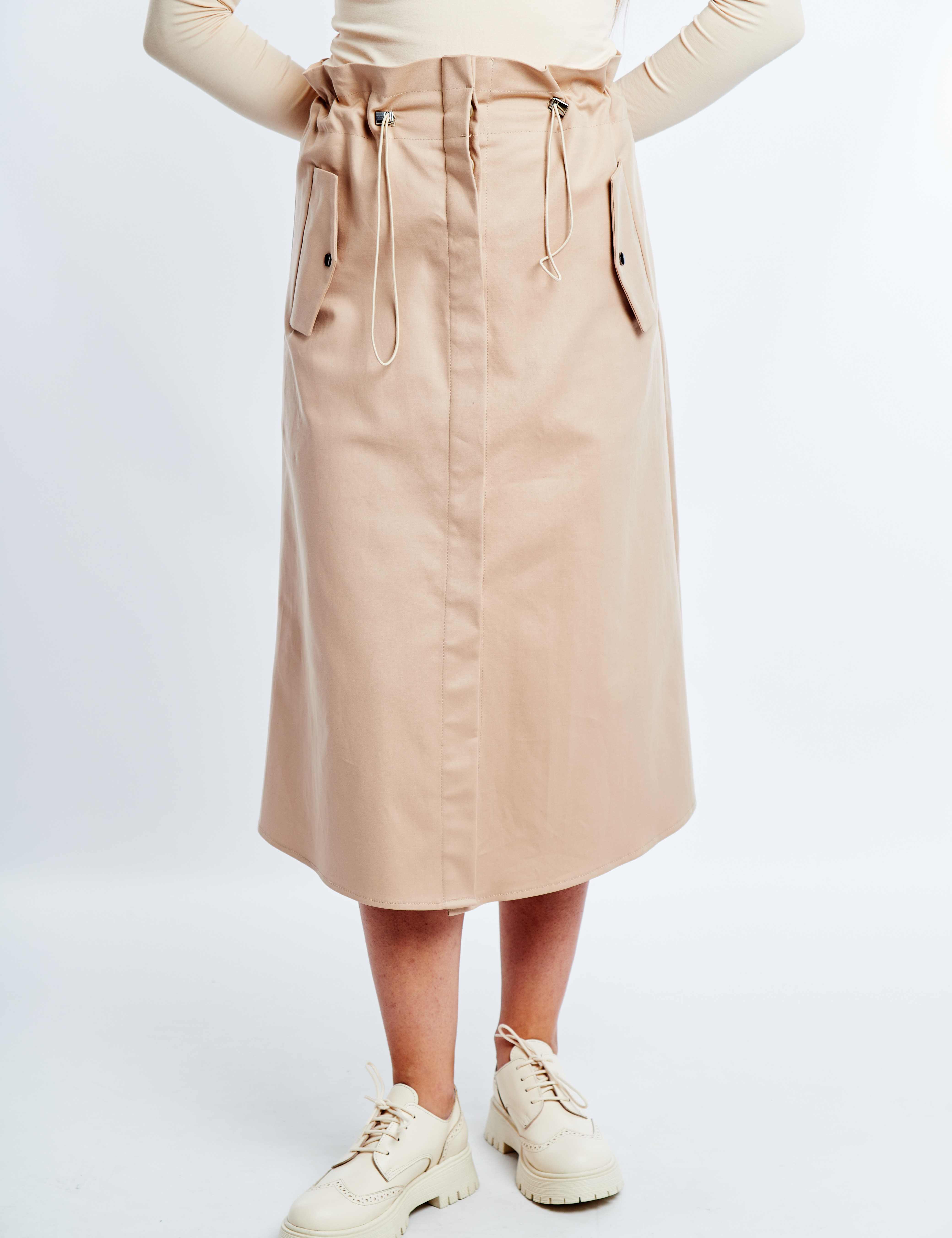 Картинка Бежева спідниця