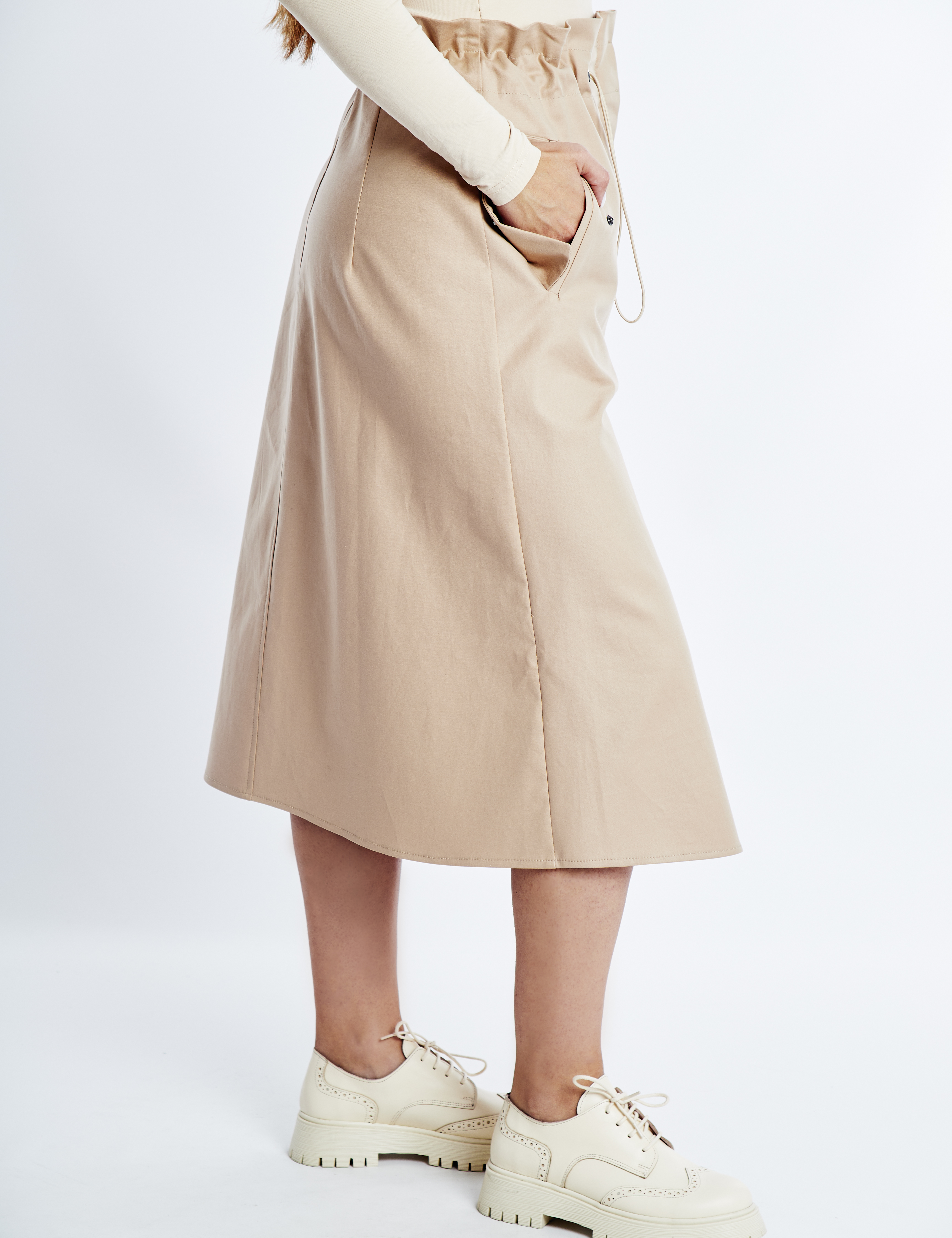 Картинка Бежева спідниця