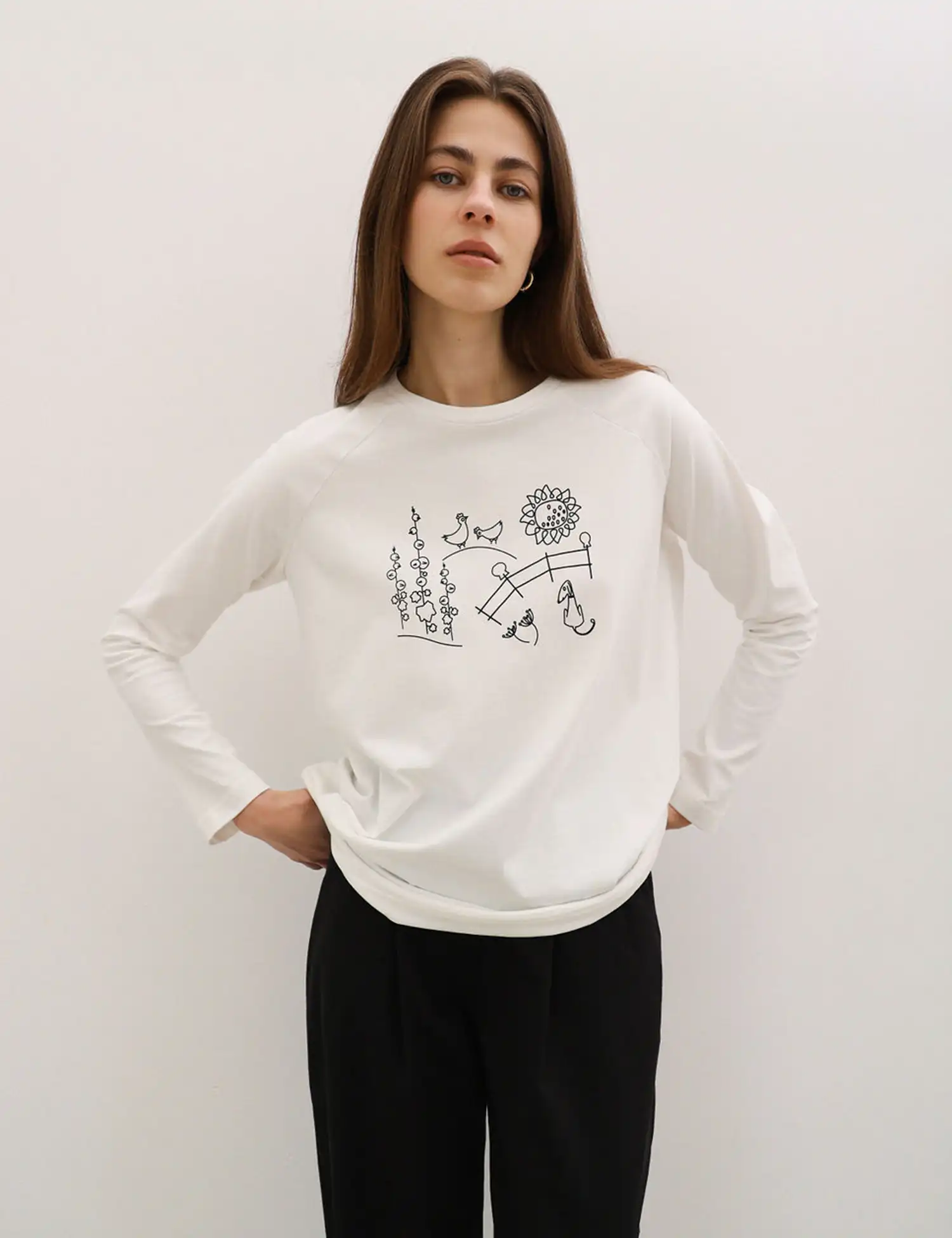 Картинка Лонгслів білий з принтом