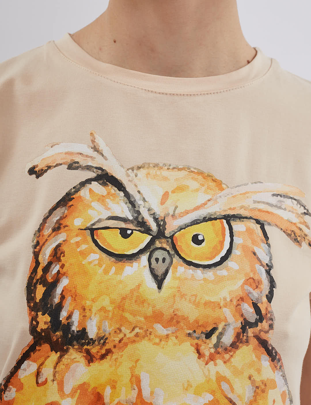 Картинка Футболка бежева з принтом