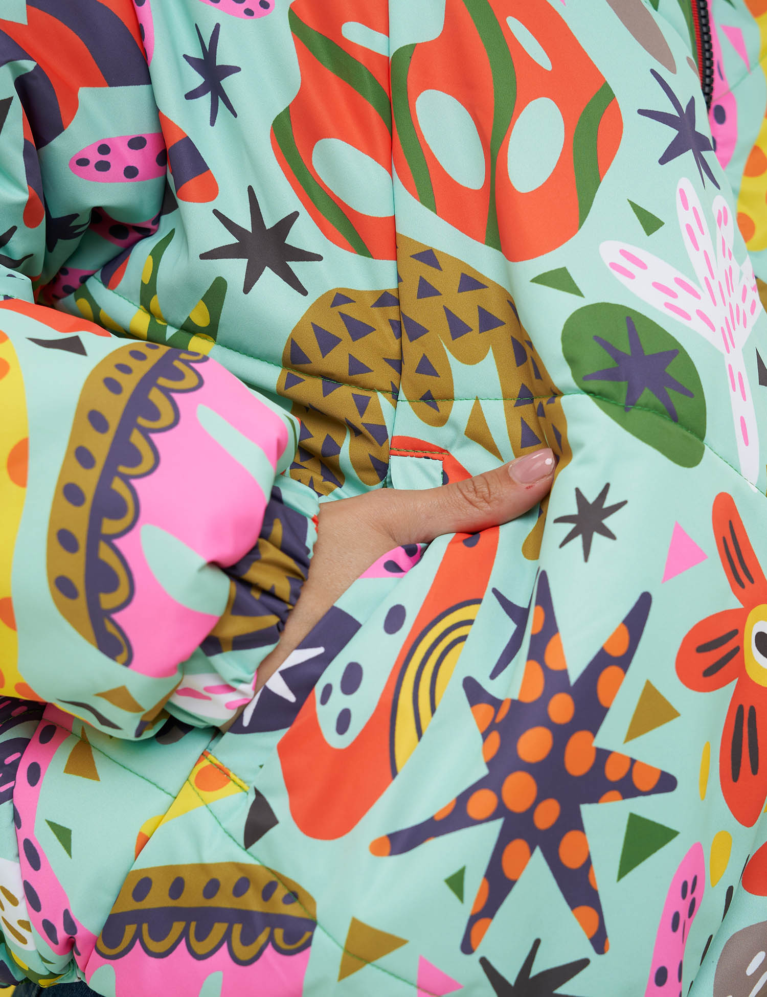 Картинка Куртка світло-зелена з принтом