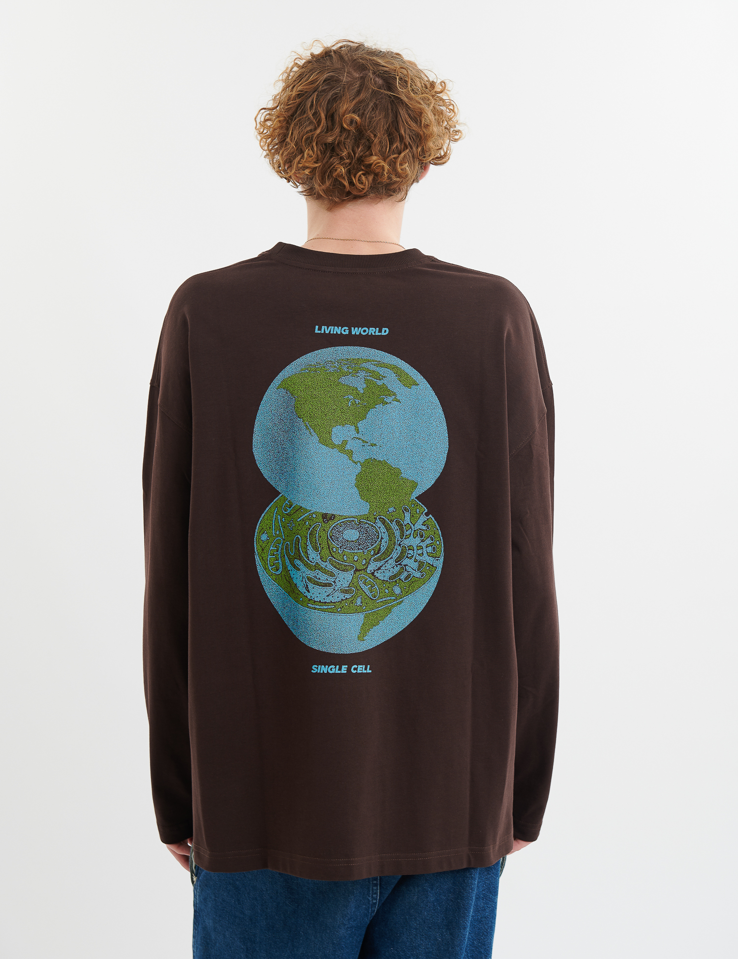 Картинка Лонгслів темно-коричневий з принтом 