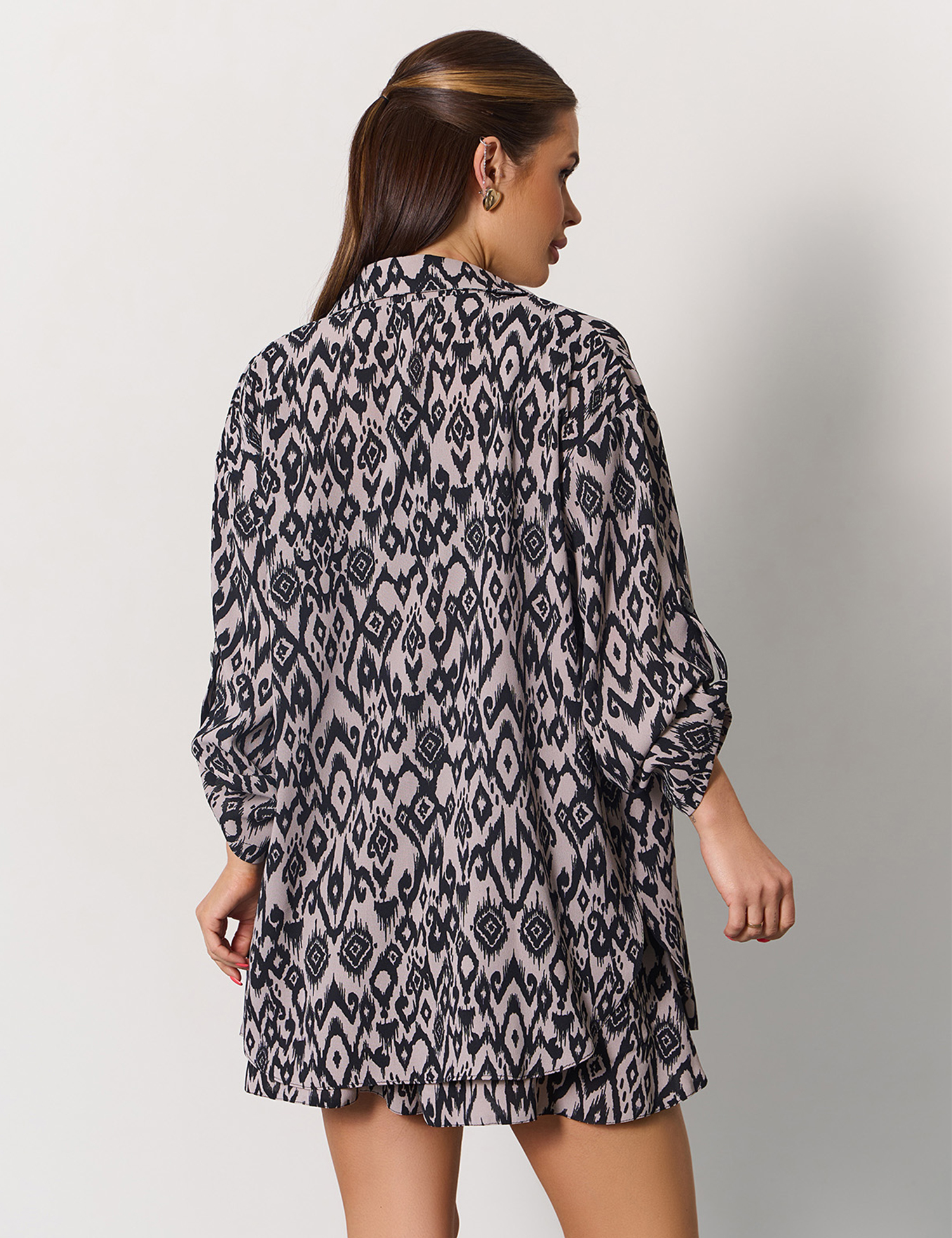 Картинка Костюм бежевий з принтом 