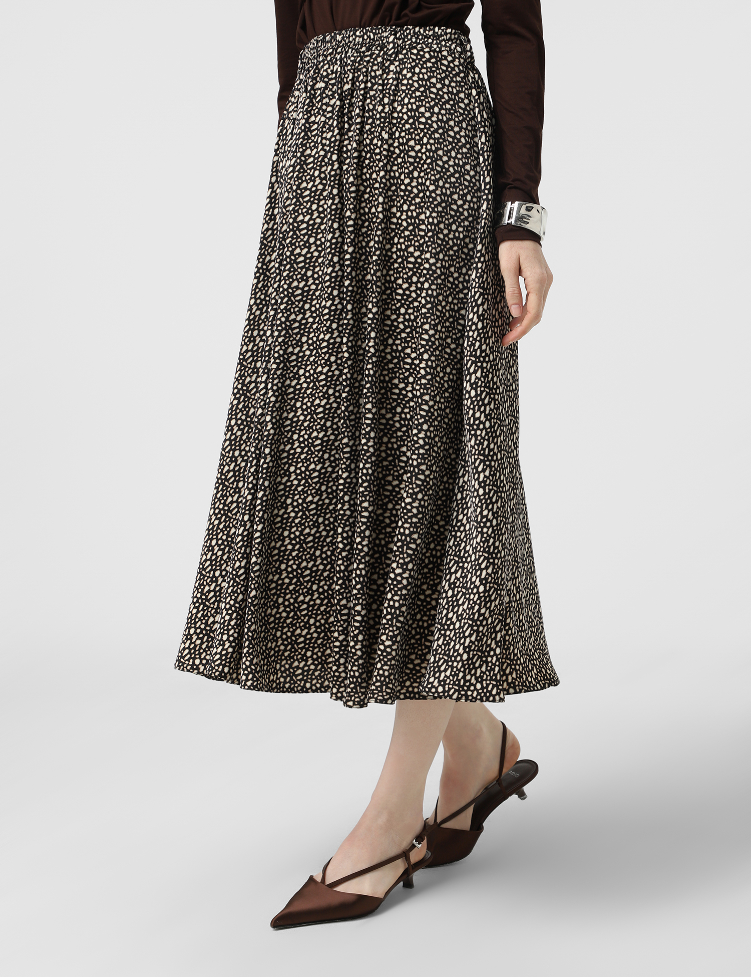 Картинка Спідниця міді чорна з принтом 