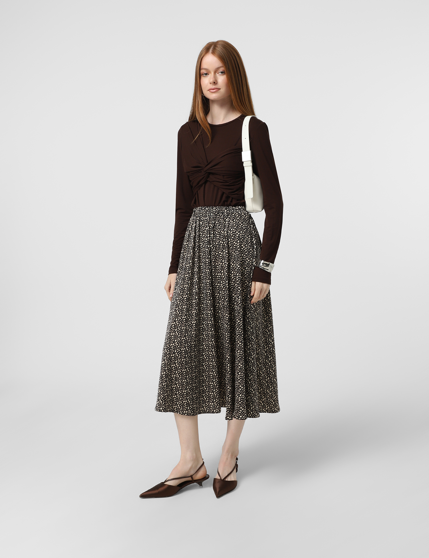 Картинка Спідниця міді чорна з принтом 