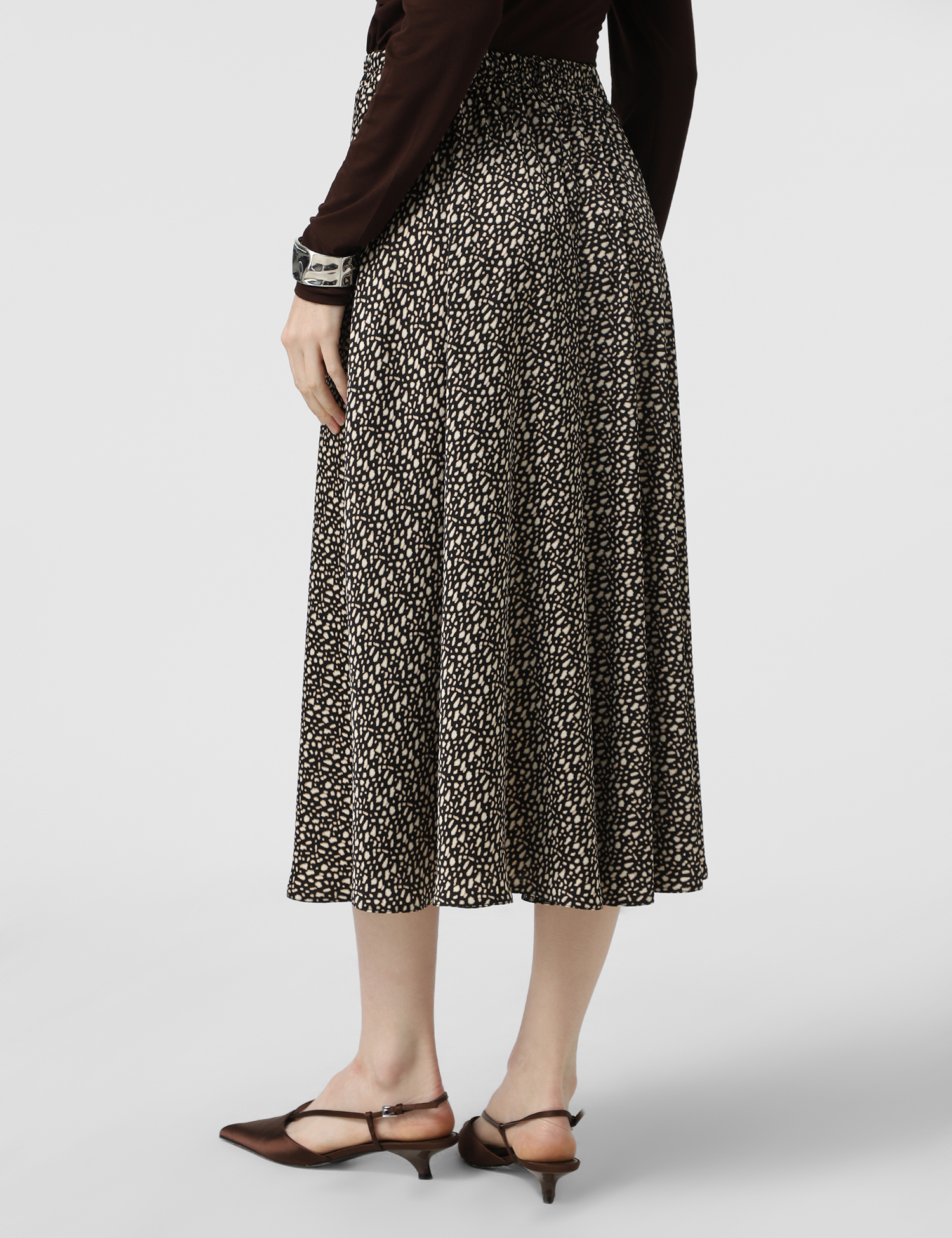 Картинка Спідниця міді чорна з принтом 