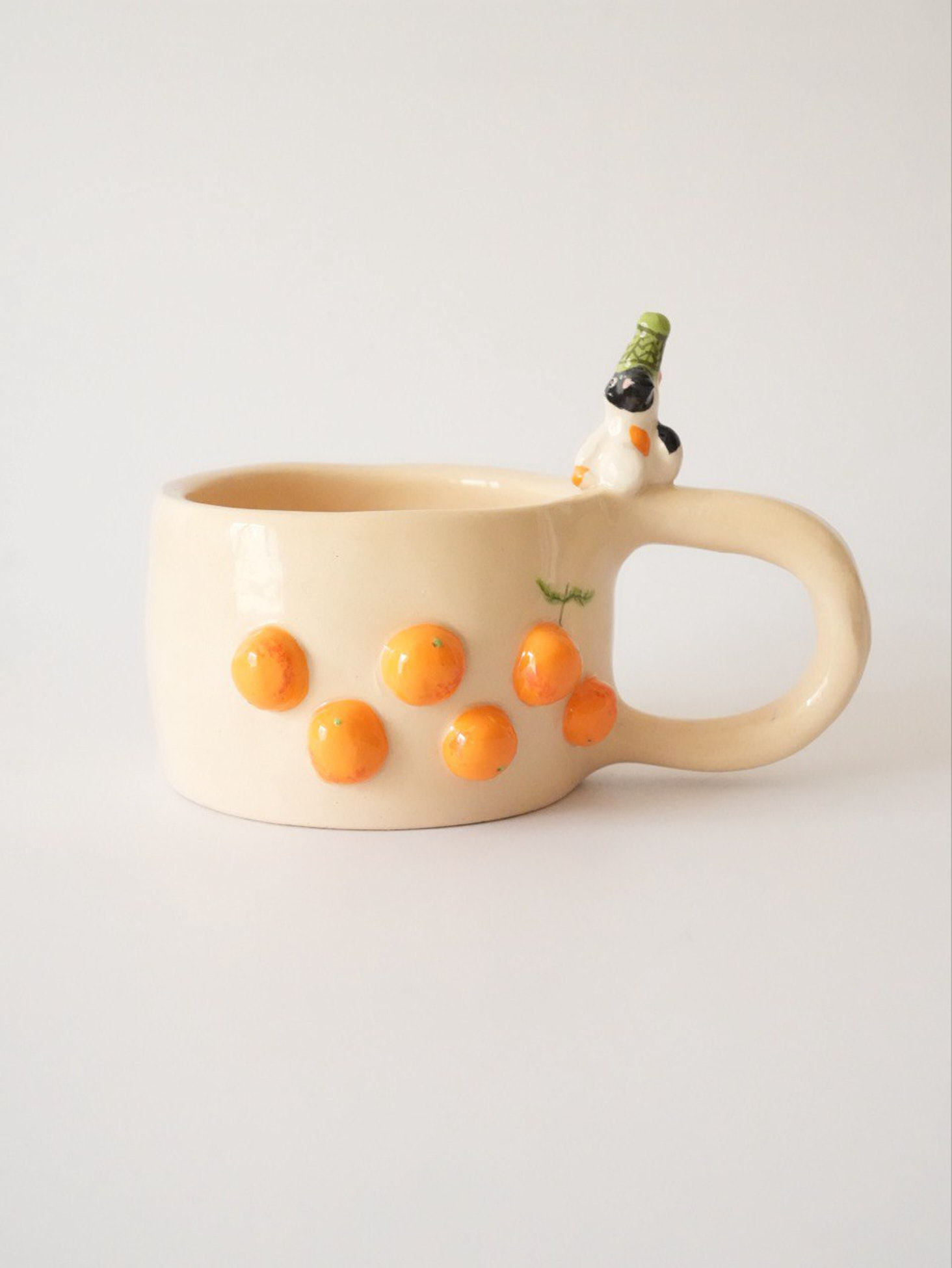 Картинка Керамічна чашка ручної роботи «Котик з мандаринками»
