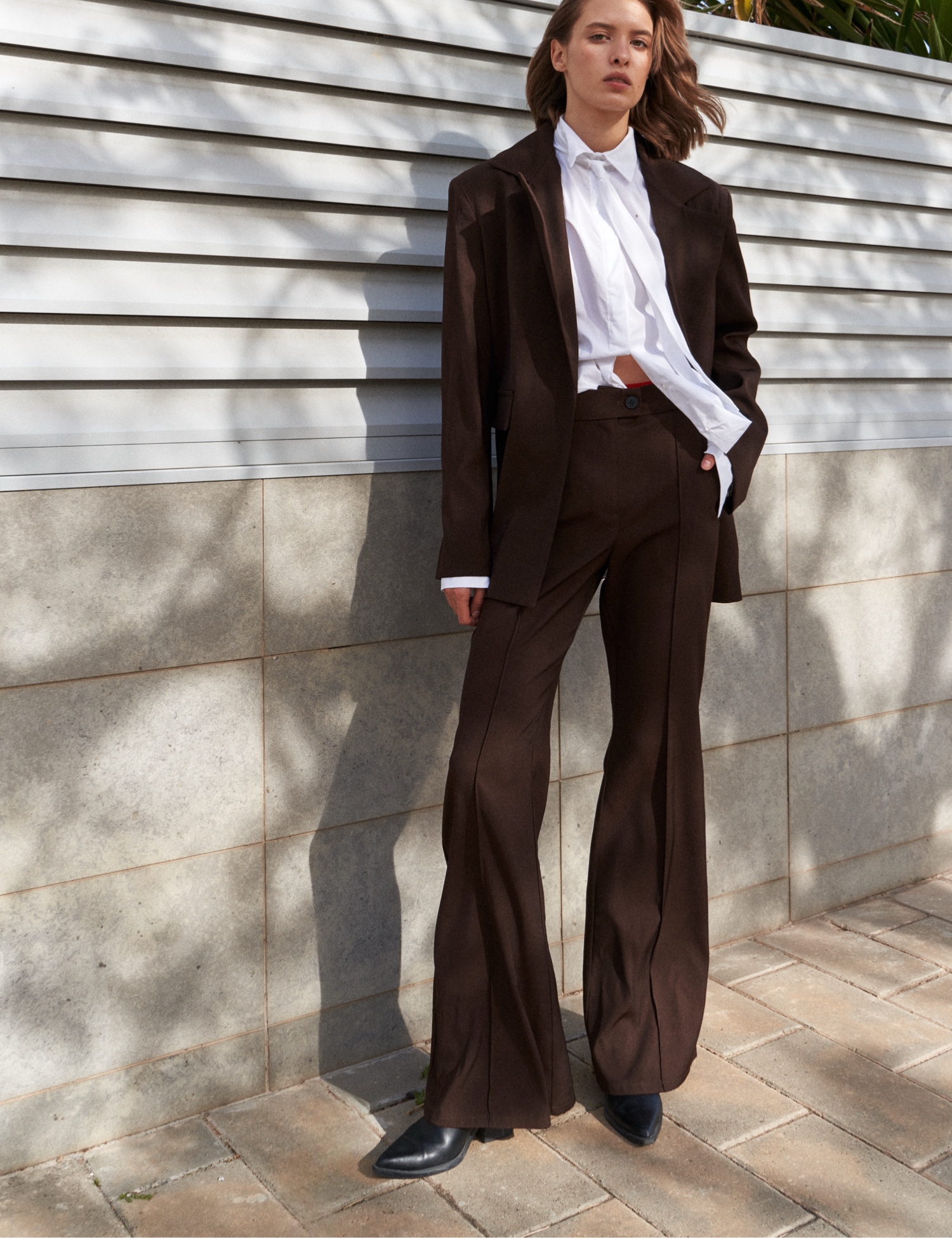 Картинка Брюки кльош коричневі