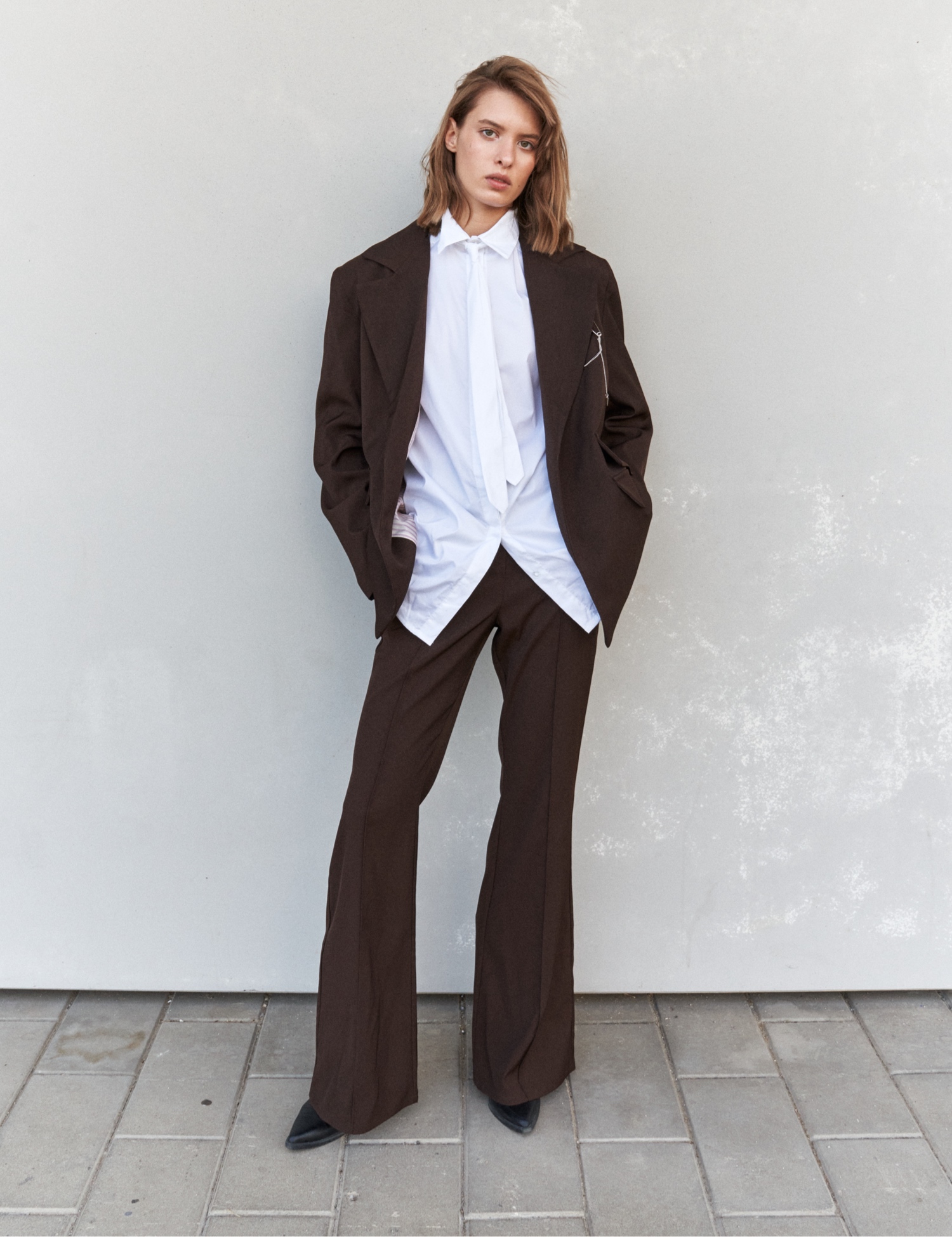 Картинка Брюки кльош коричневі