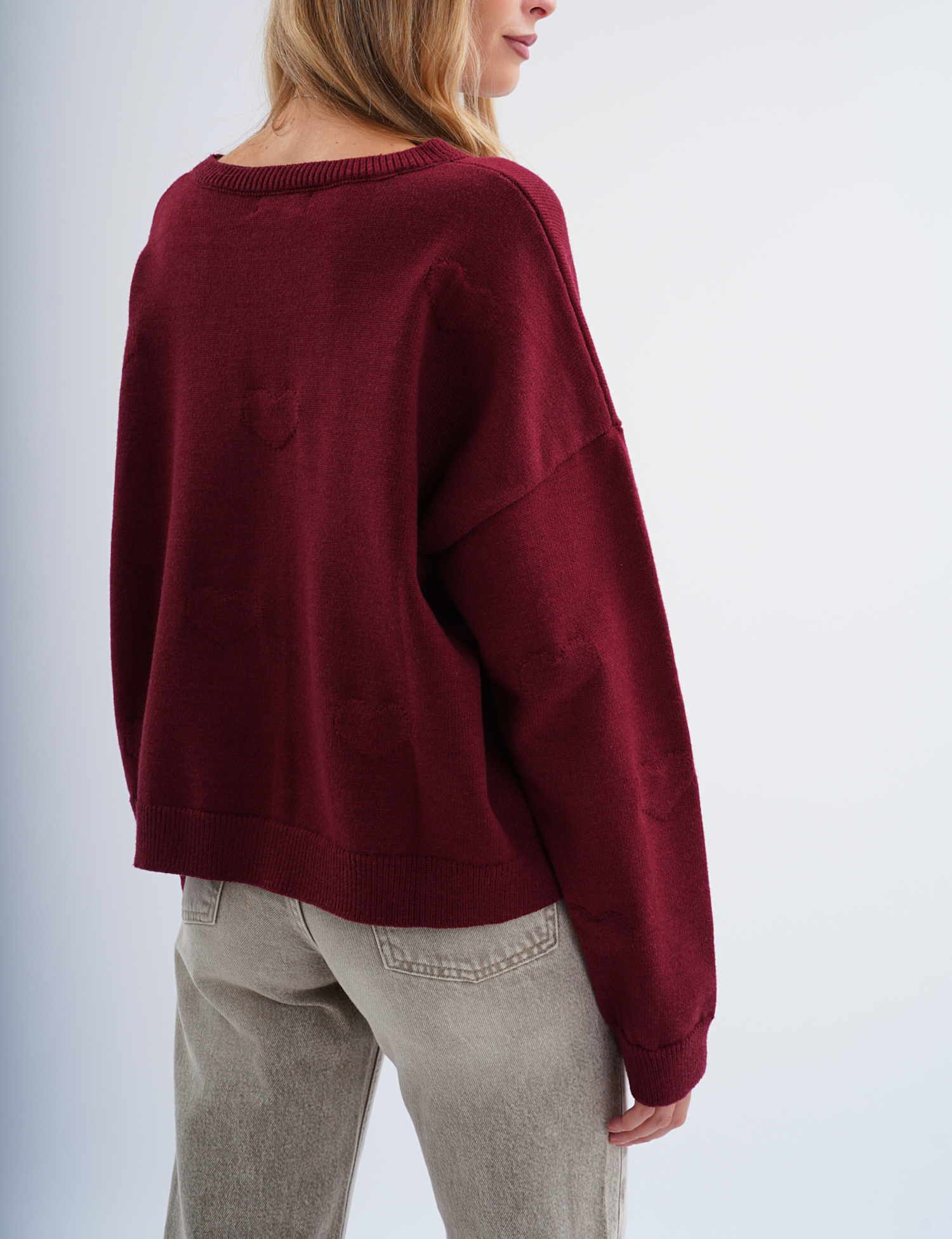 Картинка Светр oversize з жакардовими сердечками бордовий