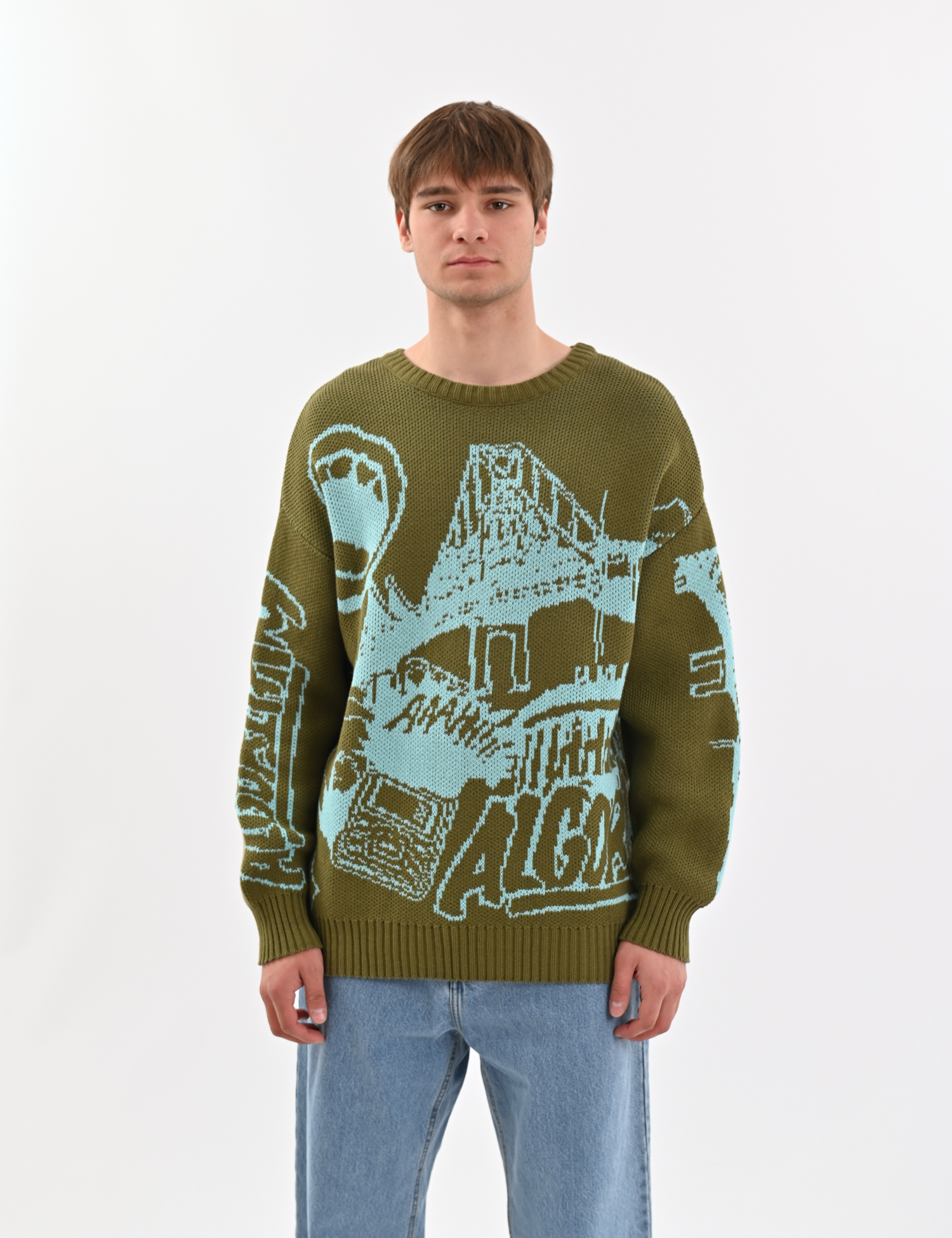 Картинка Об’ємний в’язаний светр зелений