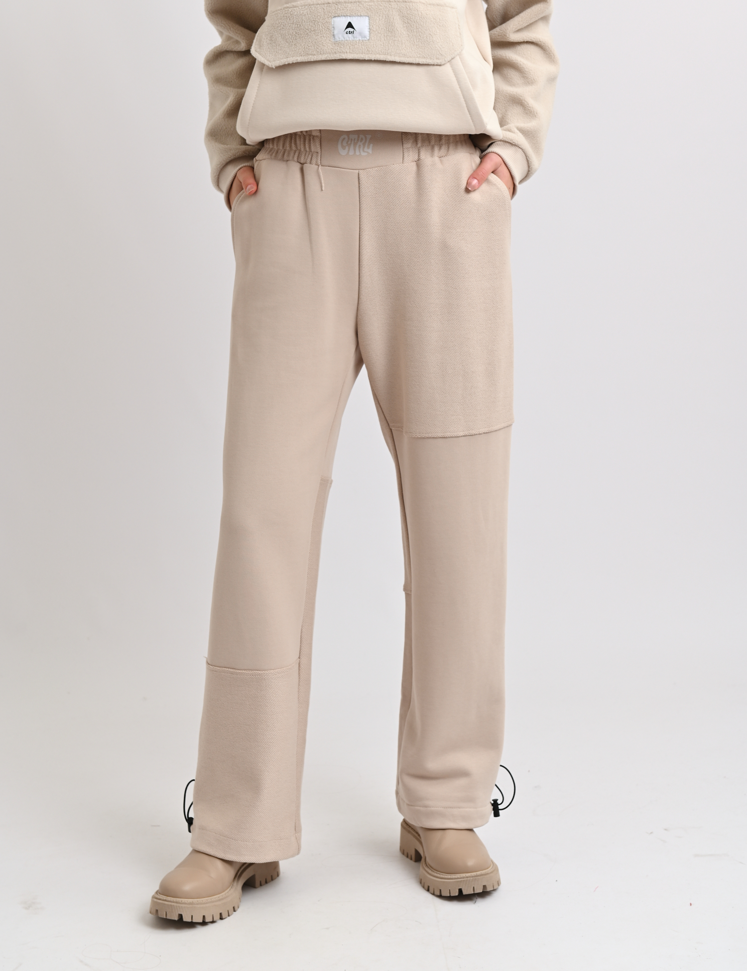Картинка Спортивні штани бежеві з еластичним поясом та регульованими манжетами