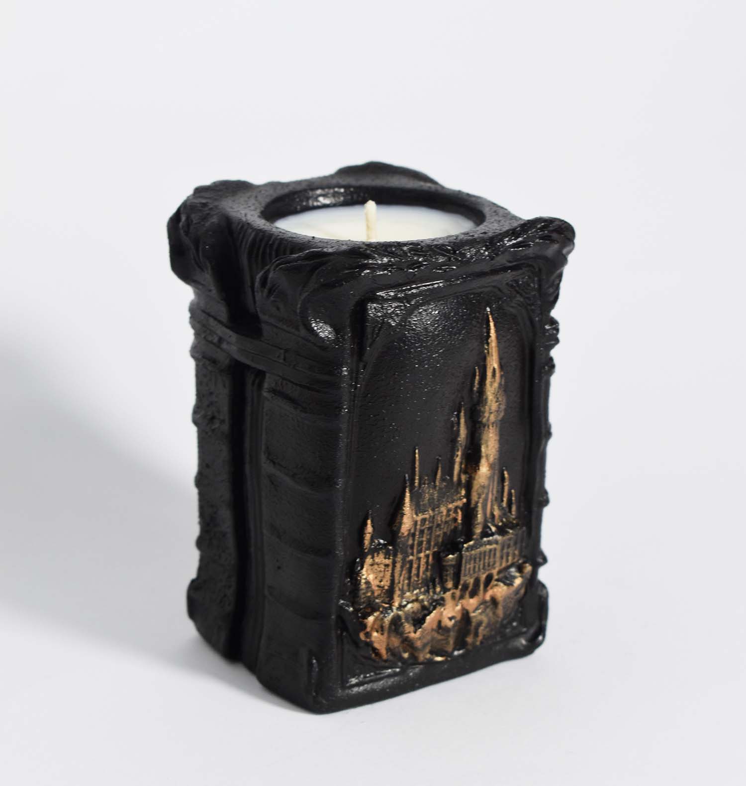 Картинка Свічка "Stories of Hogwarts" з ароматом - обіднього чаю