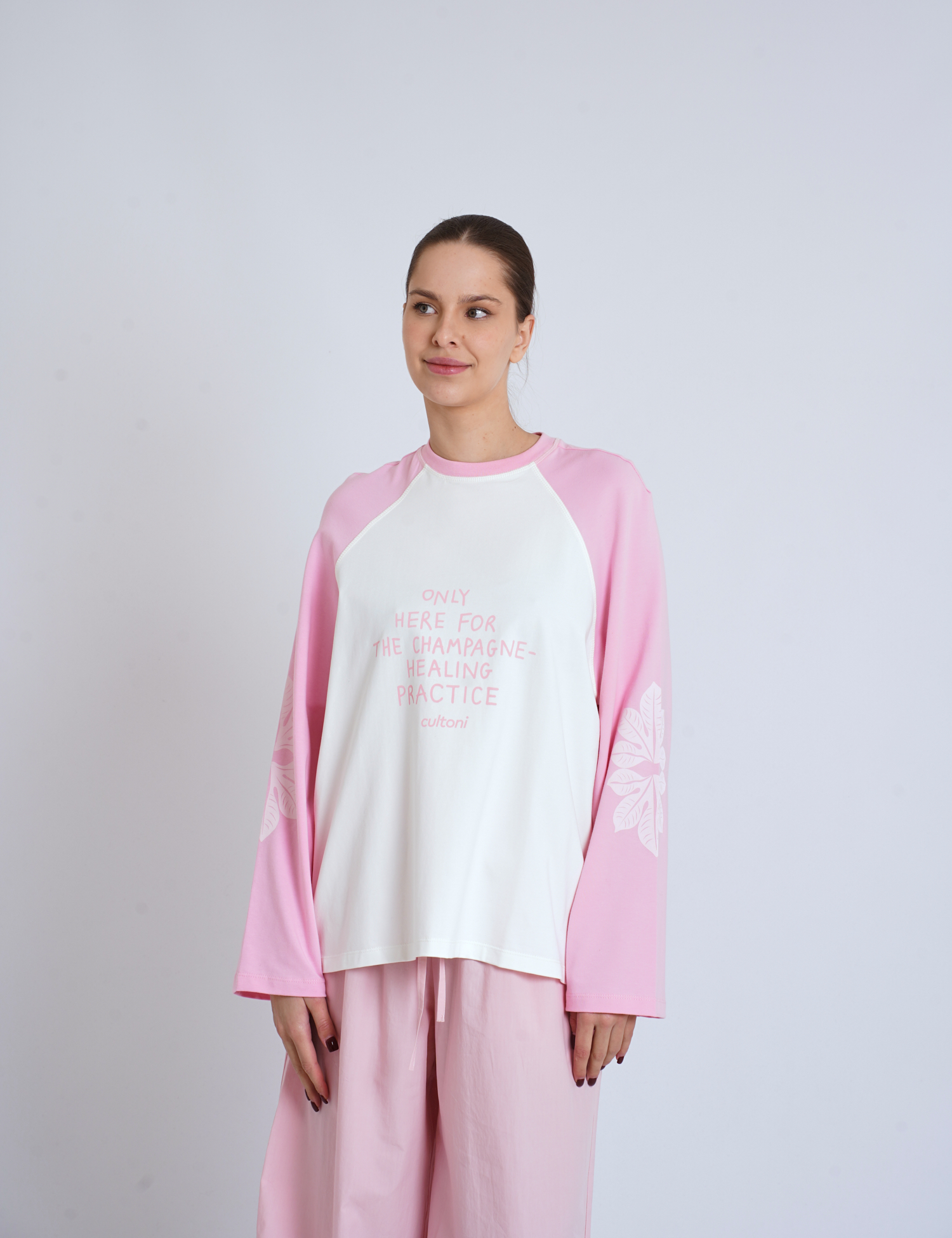 Картинка Лонгслів із реглан‑рукавами та контрастними принтами