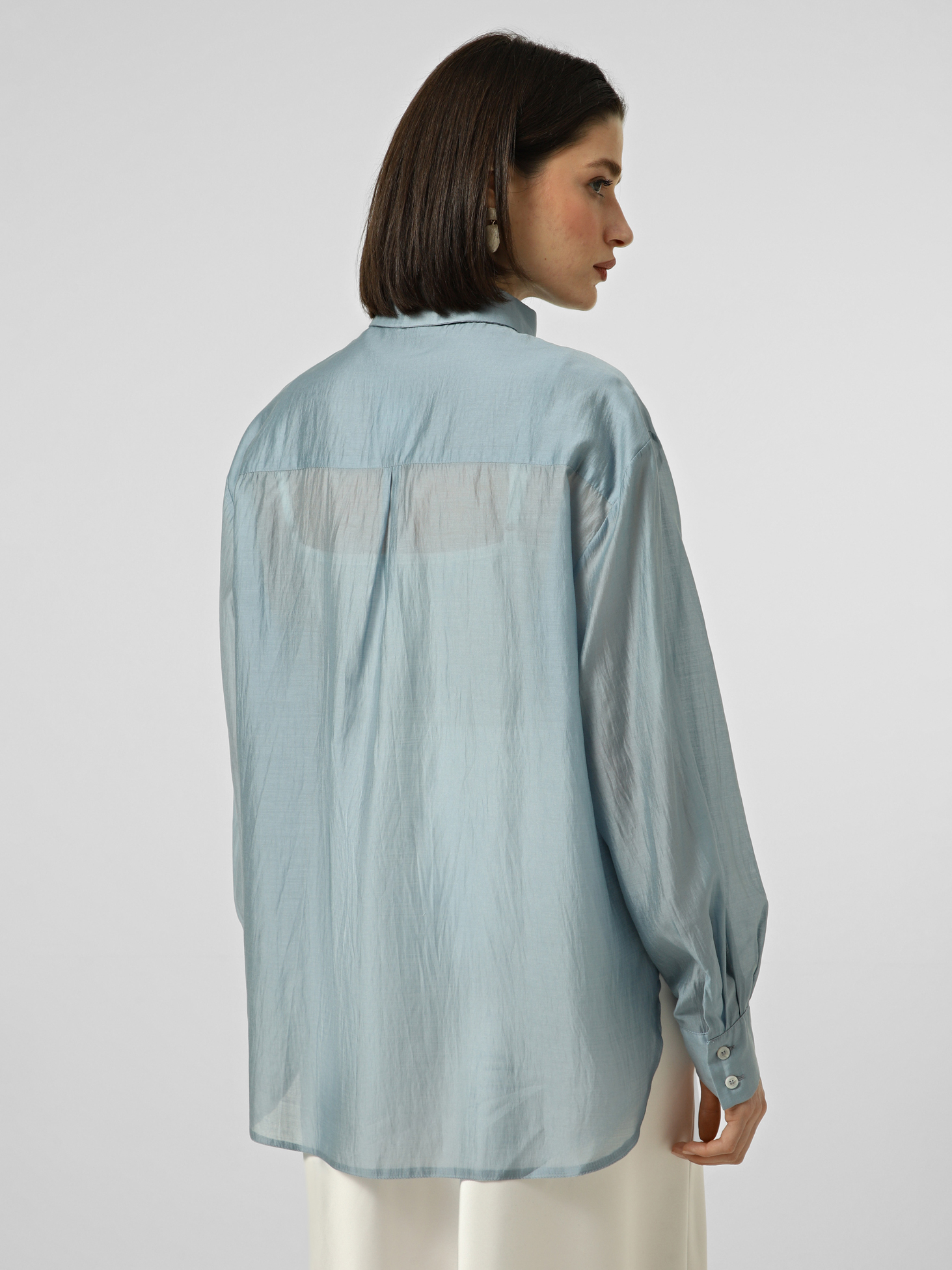 Картинка Напівпрозора блакитна сорочка oversize