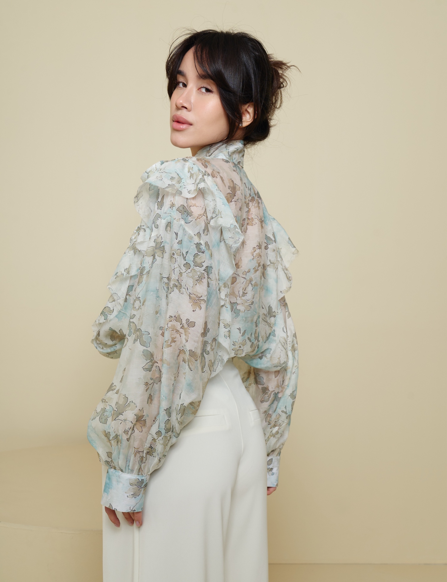 Картинка Блуза з бантом в зелену квітку