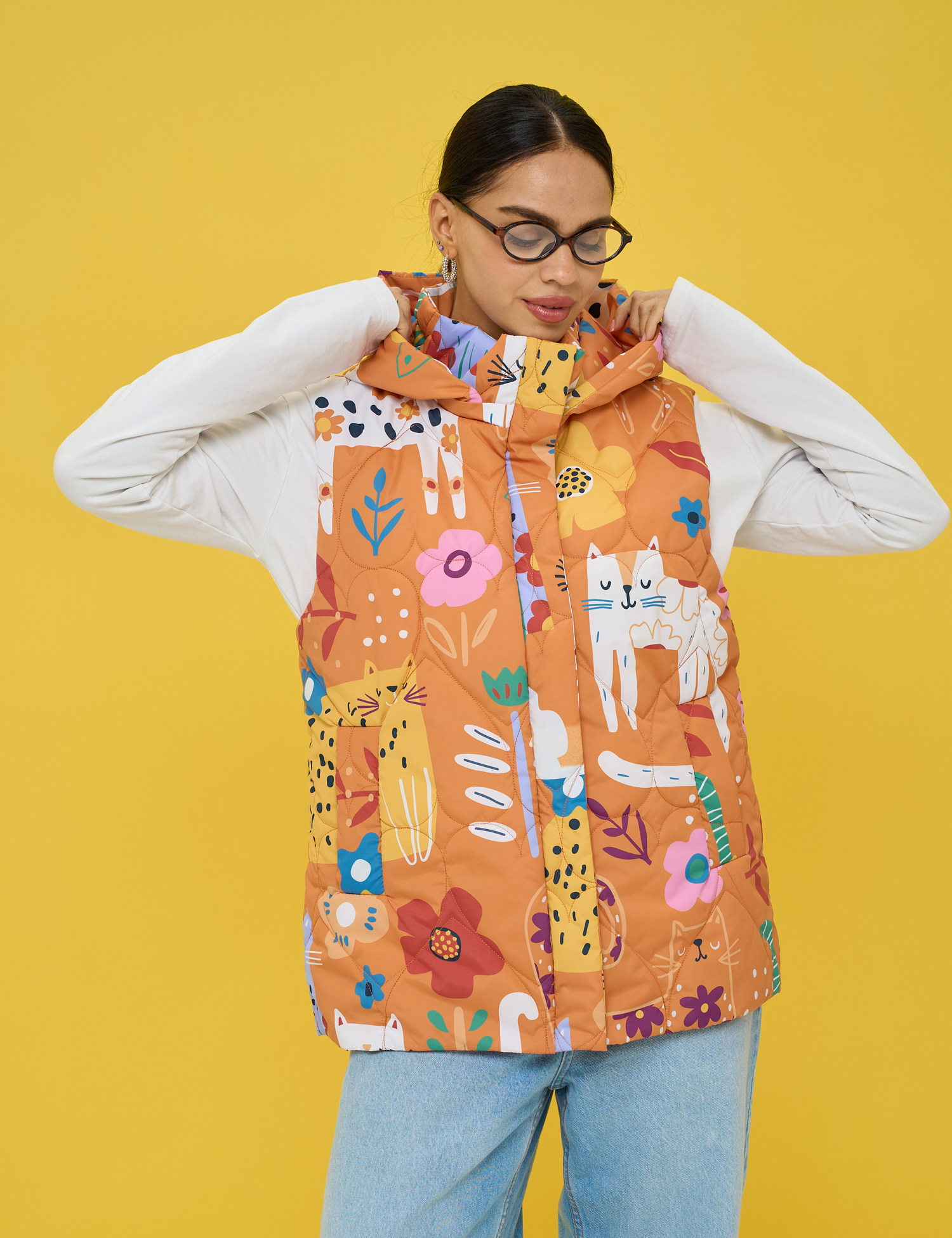 Картинка Утеплена стьобана жилетка у теплій помаранчево‑теракотовій гамі 