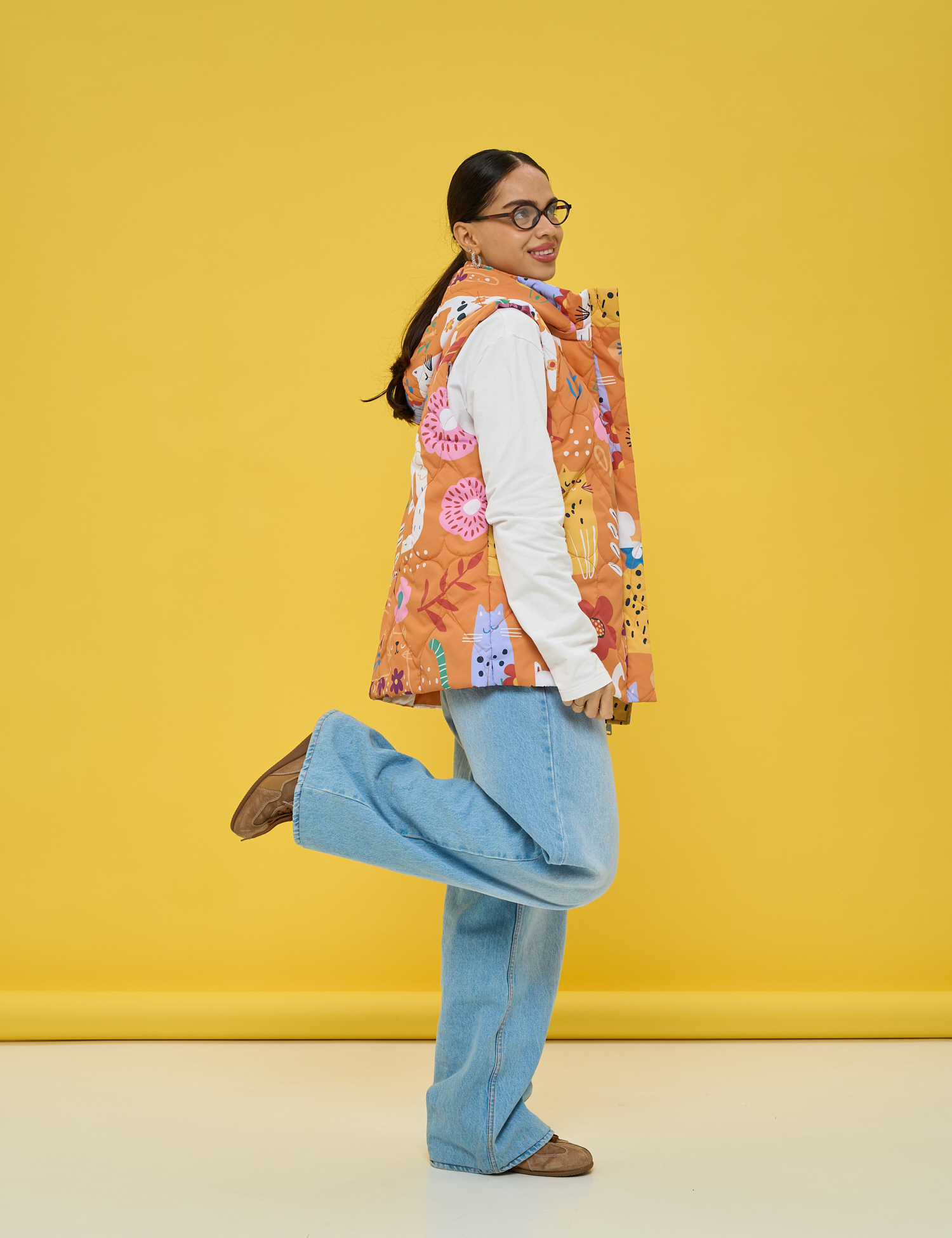 Картинка Утеплена стьобана жилетка у теплій помаранчево‑теракотовій гамі 