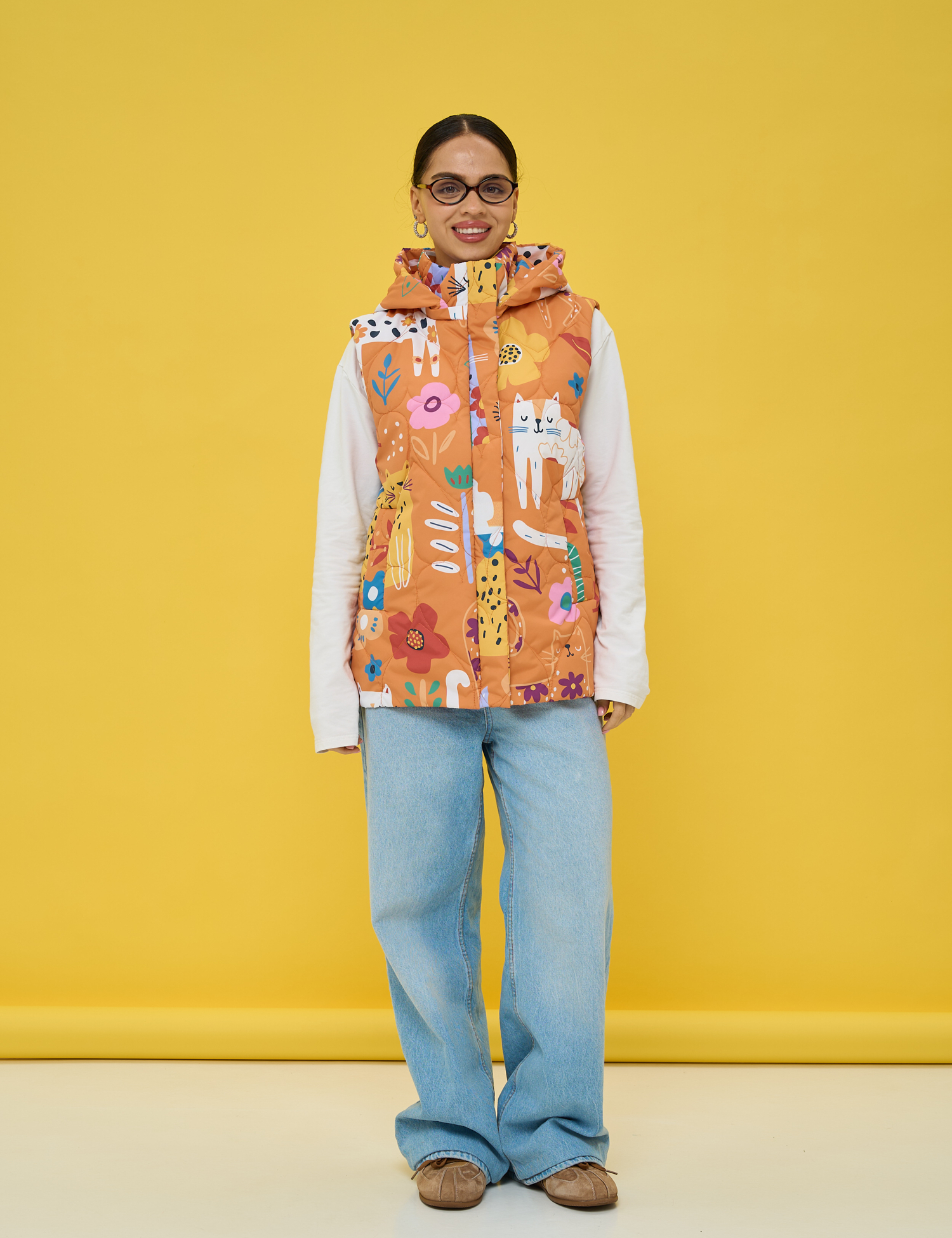 Картинка Утеплена стьобана жилетка у теплій помаранчево‑теракотовій гамі 