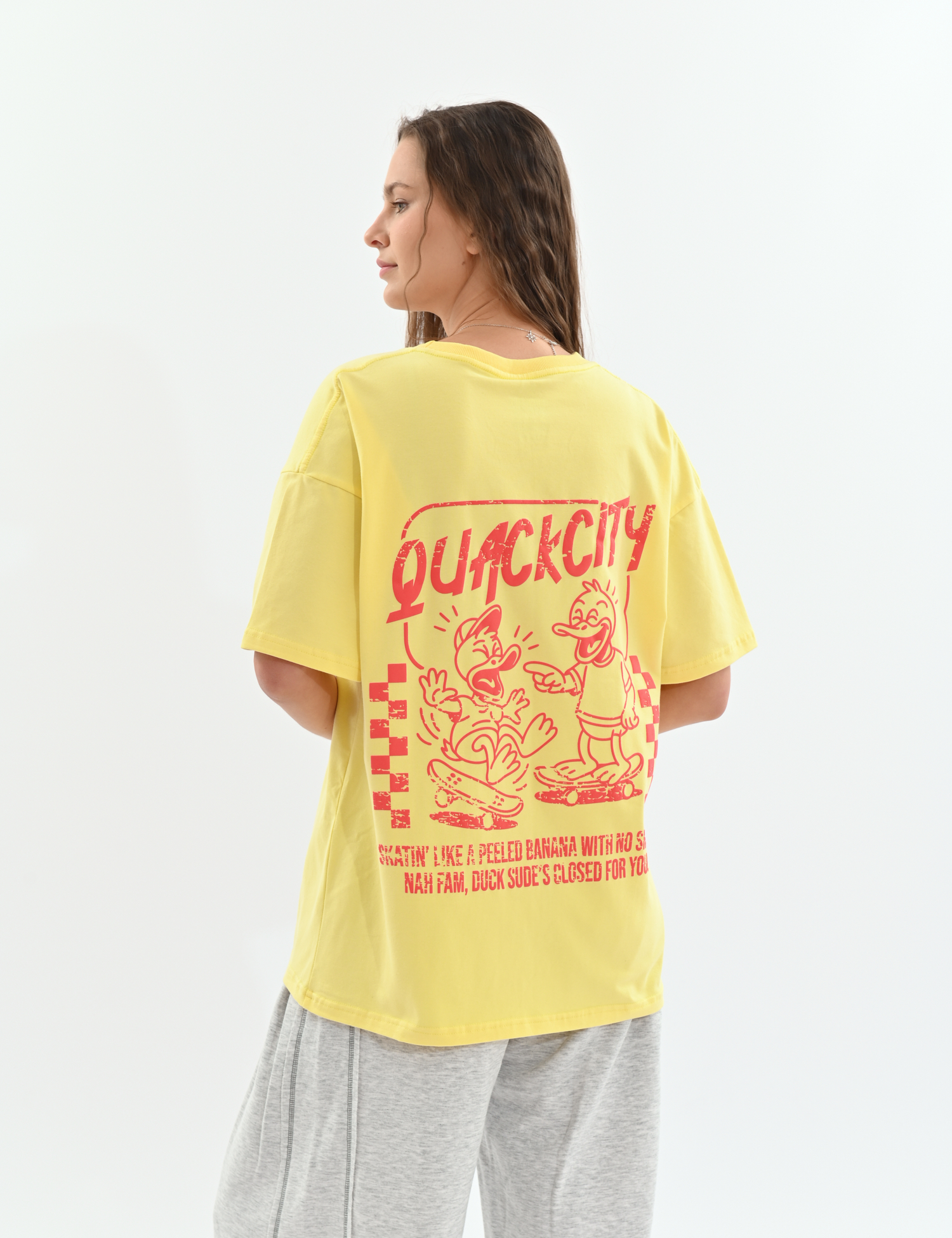 Картинка Футболка oversize з авторським принтом жовта