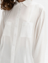 Картинка Біла шовкова сорочка