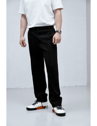 Чорні чоловічі штани Картинка Чорні чоловічі штани