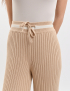 Картинка Брюки бежеві в рубчик