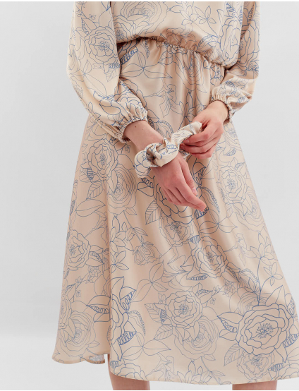 Картинка Сукня міді бежева з принтом