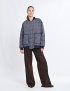 Картинка Жакет у дрібну клітинку з контрастними деталями