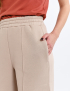 Картинка Брюки широкого крою бежеві
