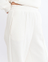 Картинка Брюки широкого крою білі