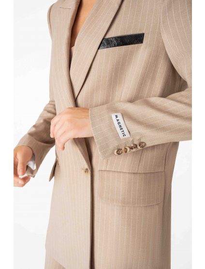 Картинка Піджак бежевий з принтом 