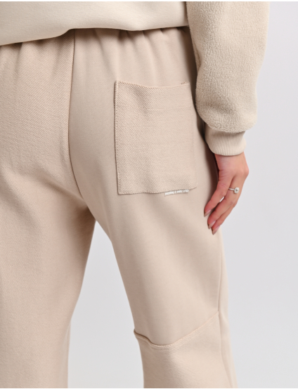 Картинка Спортивні штани бежеві з еластичним поясом та регульованими манжетами