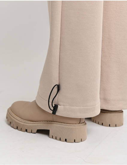 Картинка Спортивні штани бежеві з еластичним поясом та регульованими манжетами