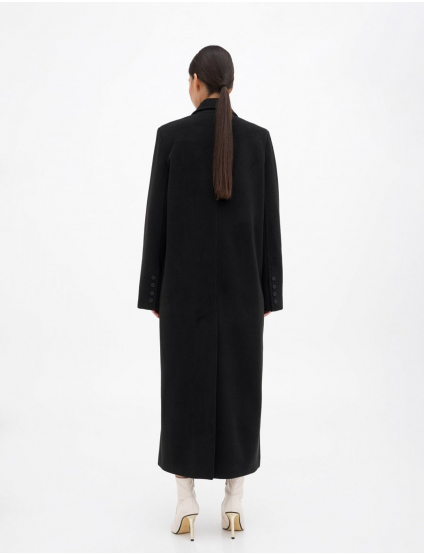 Картинка Довге чорне пальто зі шліцею