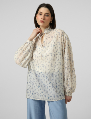Ніжна напівпрозора блуза з флоральним принтом Картинка Ніжна напівпрозора блуза з флоральним принтом