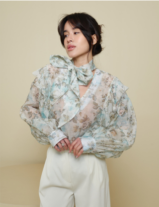 Картинка Блуза з бантом в зелену квітку