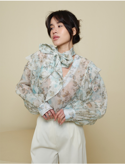 Картинка Блуза з бантом в зелену квітку