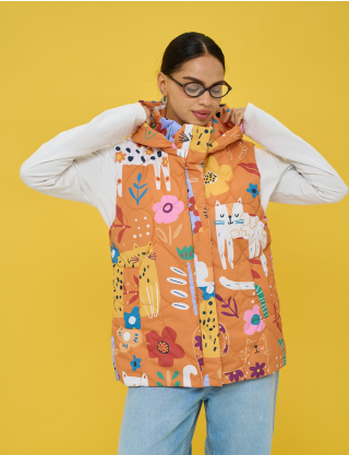 Картинка Утеплена стьобана жилетка у теплій помаранчево‑теракотовій гамі 