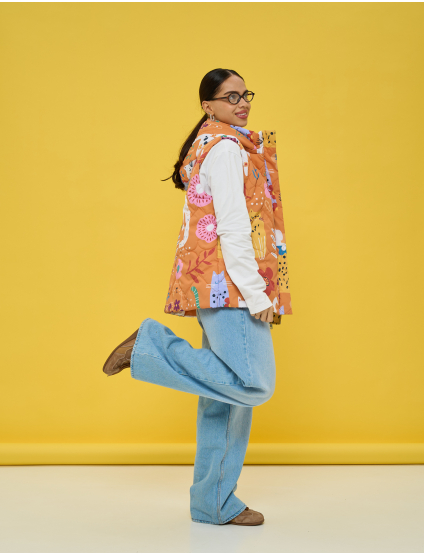 Картинка Утеплена стьобана жилетка у теплій помаранчево‑теракотовій гамі 