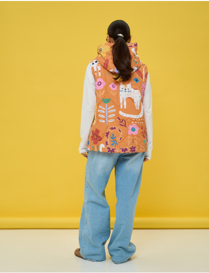 Картинка Утеплена стьобана жилетка у теплій помаранчево‑теракотовій гамі 