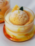 Картинка Свічка із серії Dessert glow у вигляді апельсинового морозива