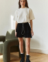 Картинка Чорна коротка спідниця з воланами