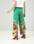 Картинка Жіночі зелені брюки з квітковим візерунком