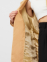 Картинка Жіночий бежевий піджак з поясом